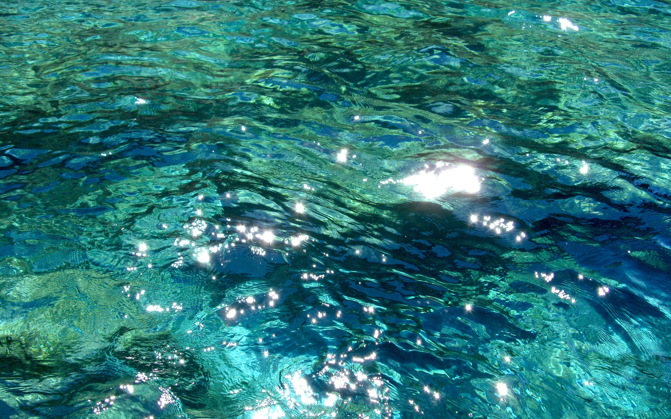 sunlit ocean water surface
