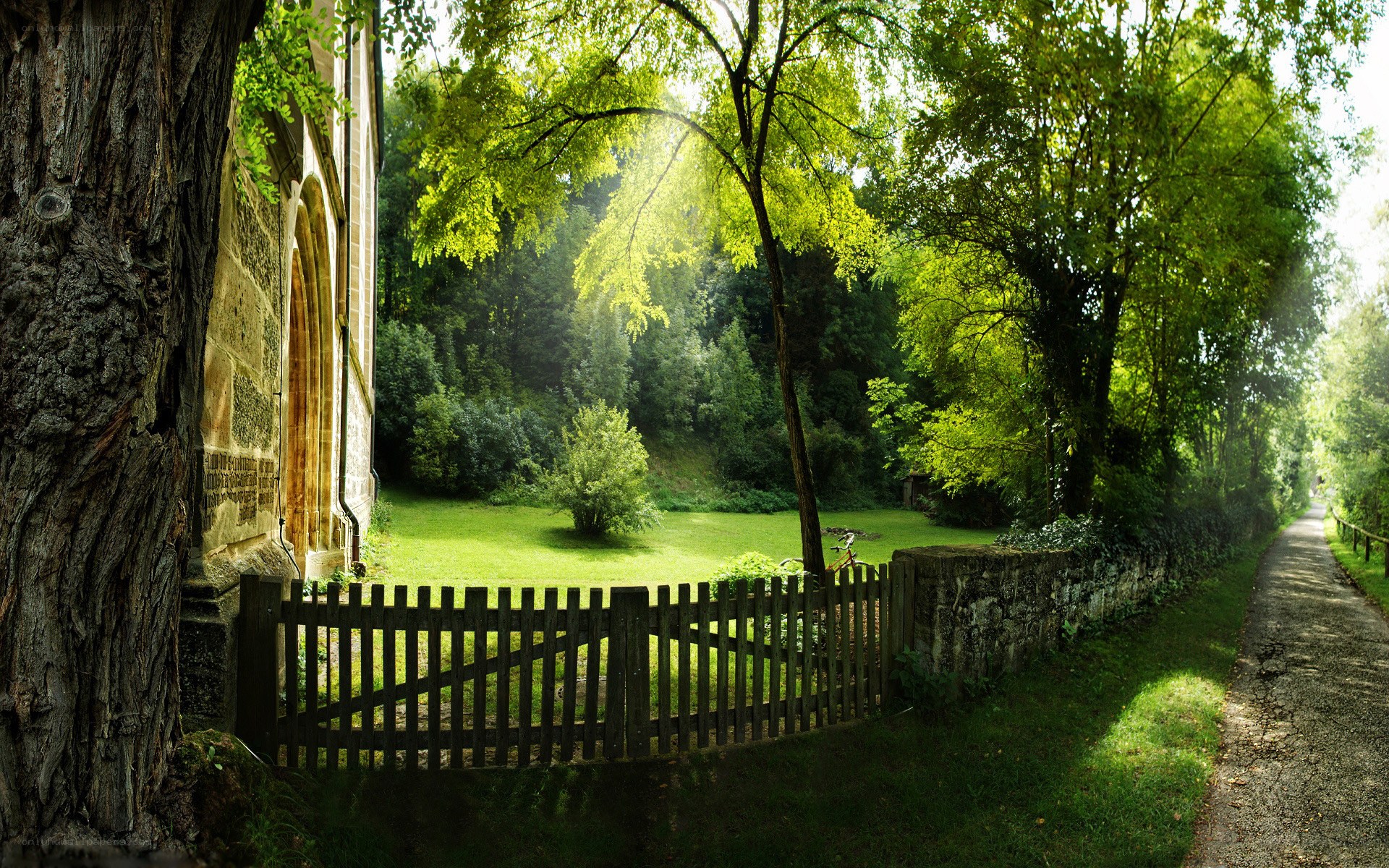 Sunlit path by old church