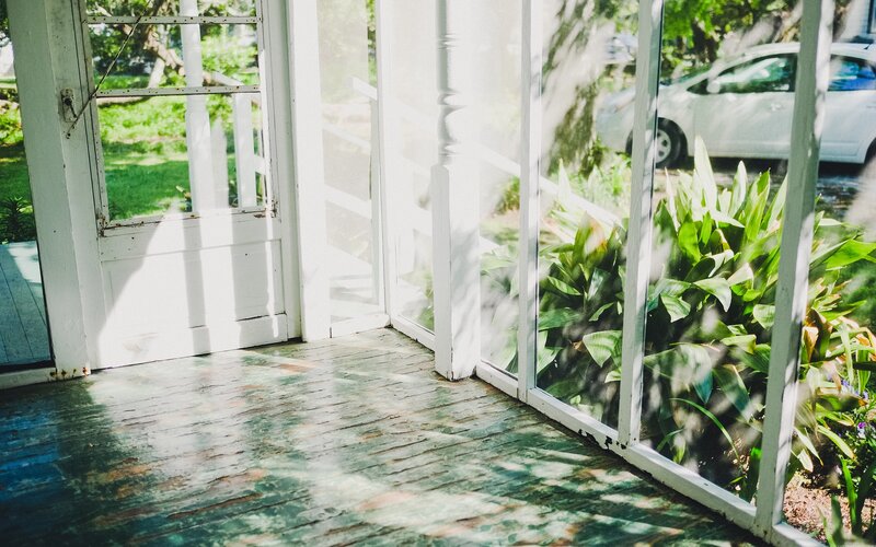 Sunlit Porch with Plants