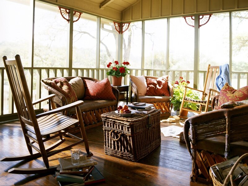Sunlit porch with rocking chairs