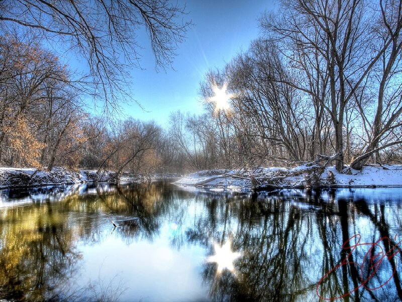 Sunlit river in winter
