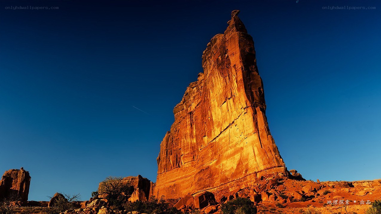 Sunlit rock formation at dusk