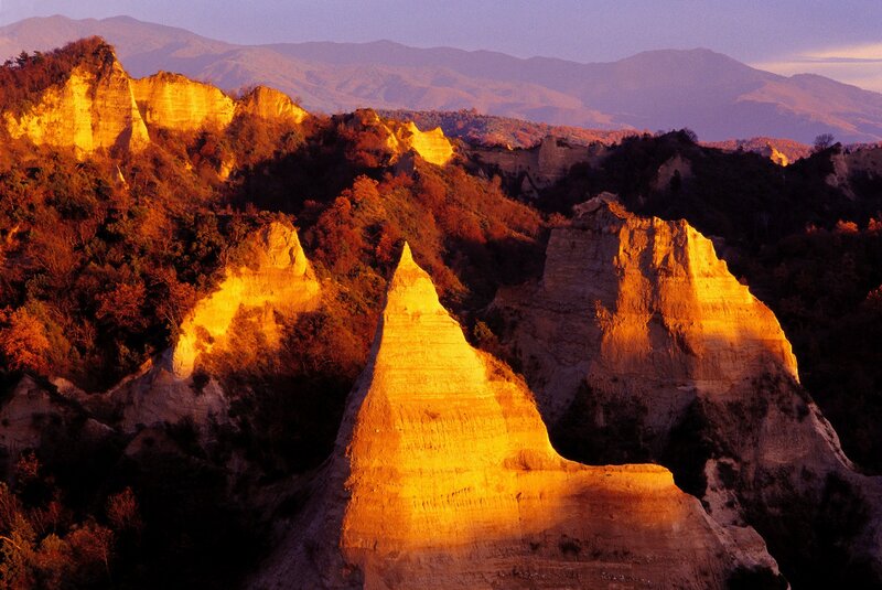 Sunlit rock formations at dusk