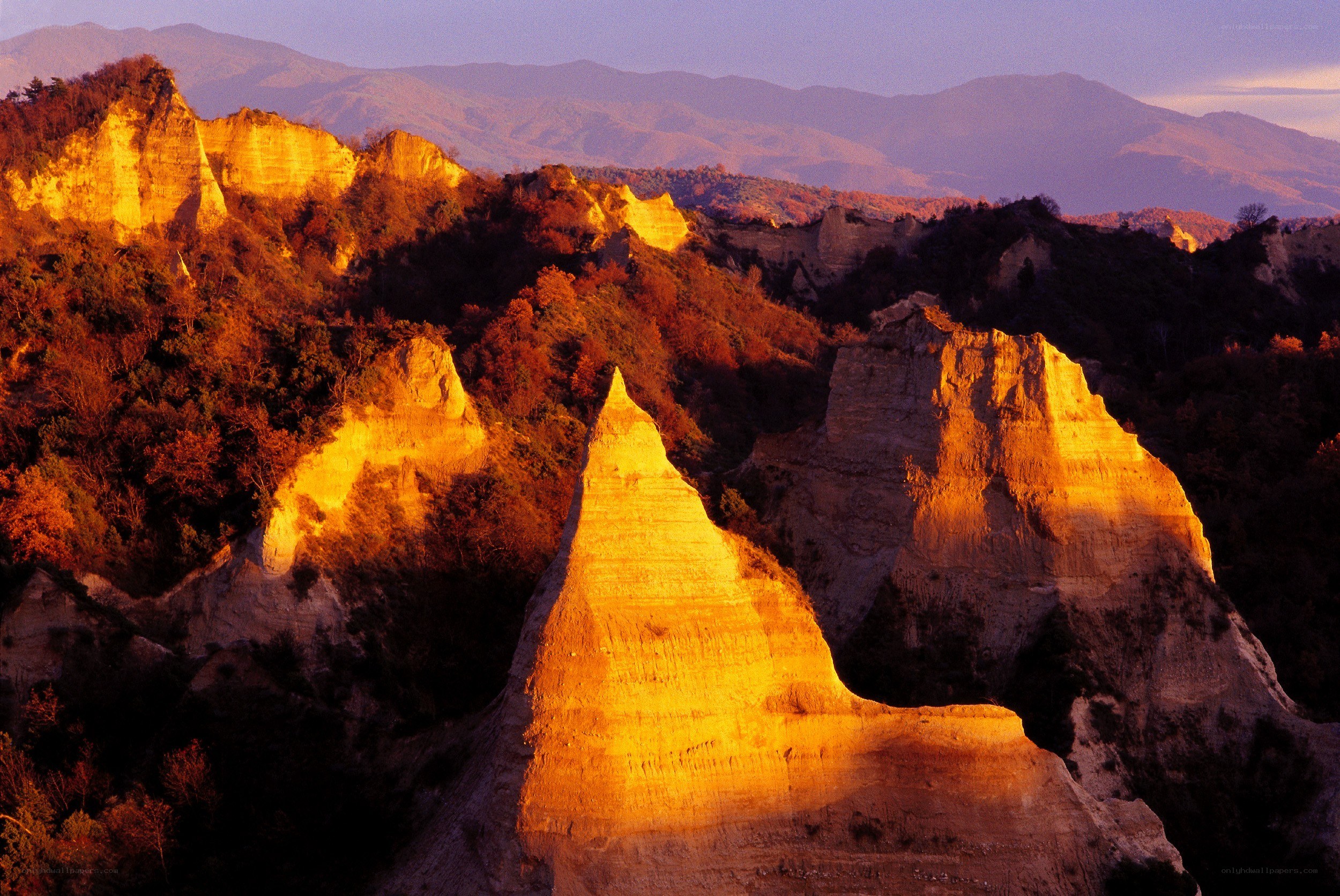 Sunlit rock formations at dusk