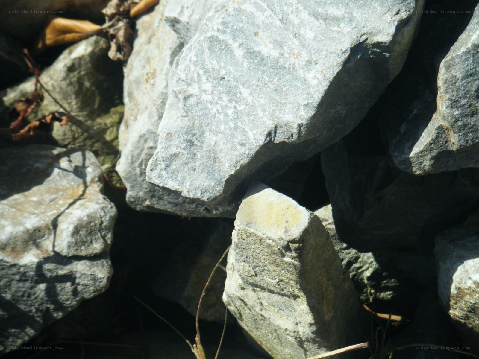 Sunlit rocks in a pile