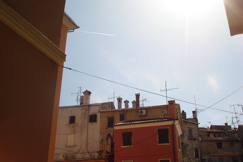 Sunlit rooftops in a European town