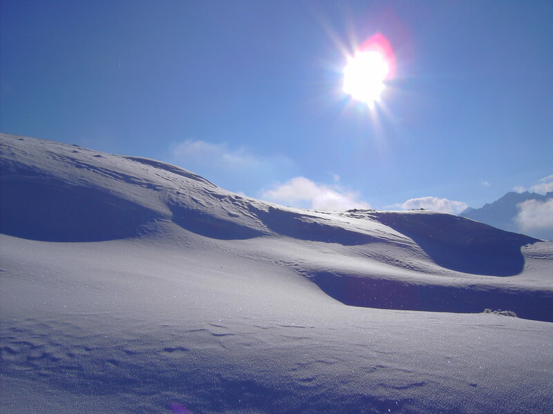 Sunlit snow-covered mountain