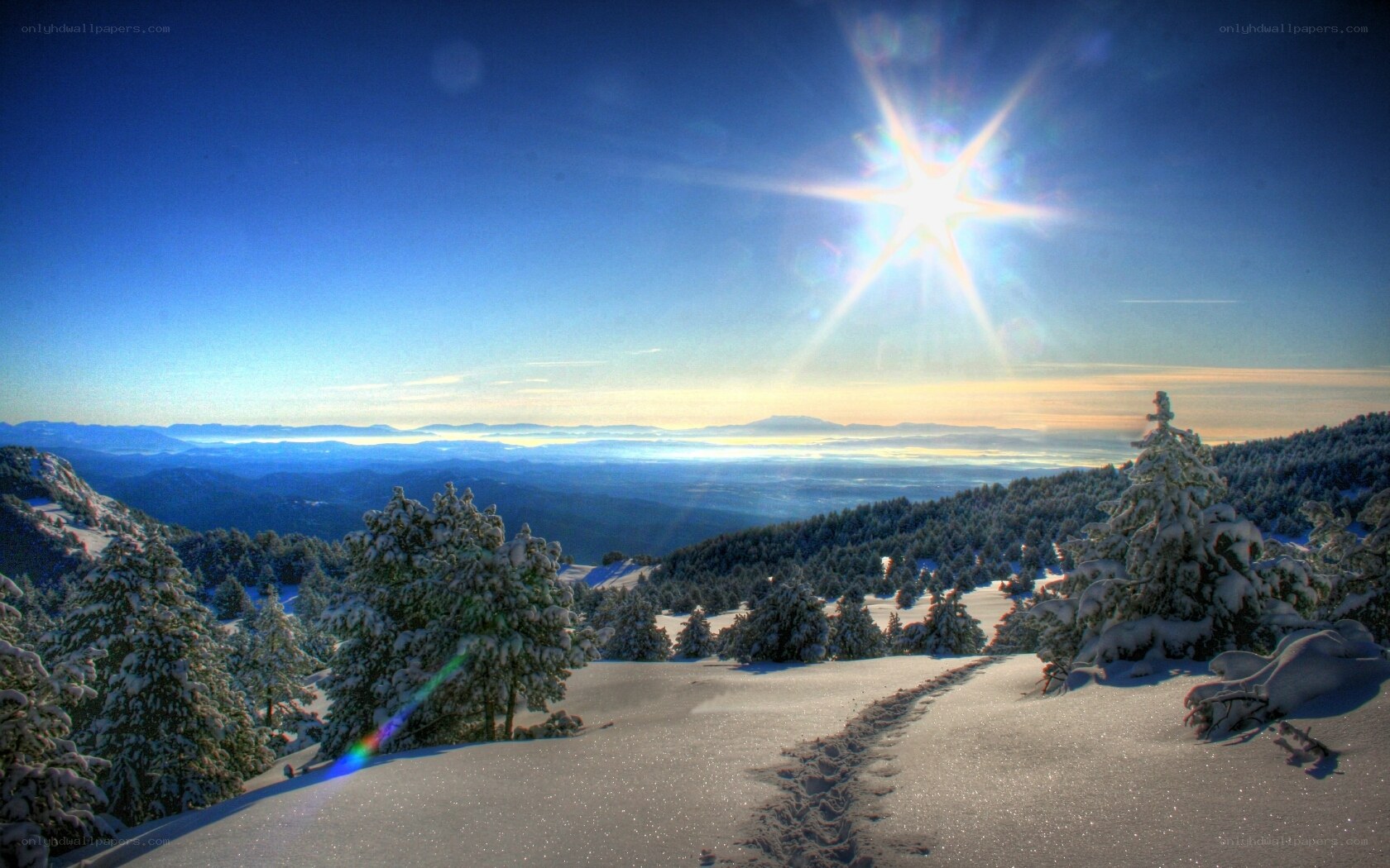 Sunlit snow-covered mountain landscape