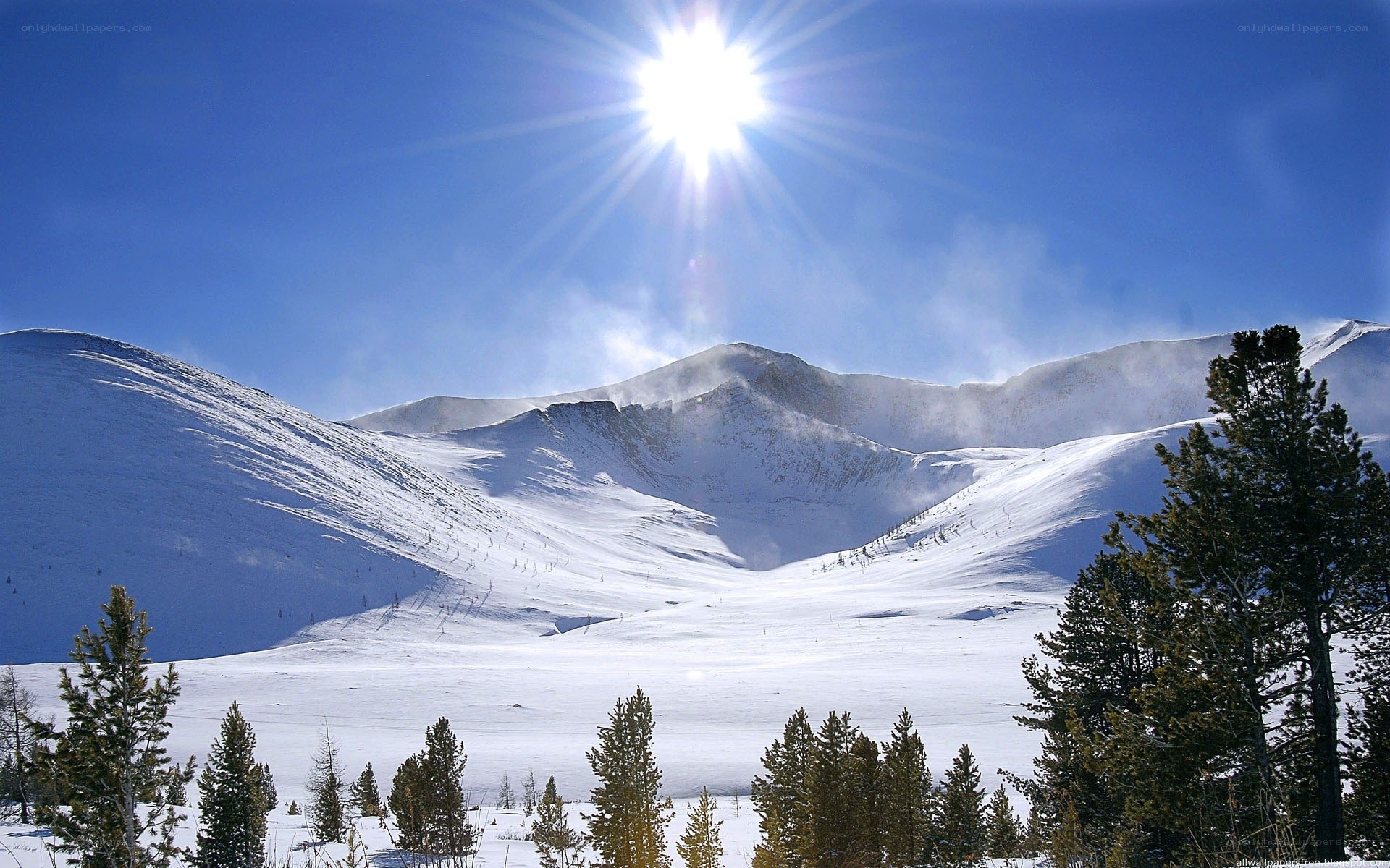 Sunlit snow-covered mountains