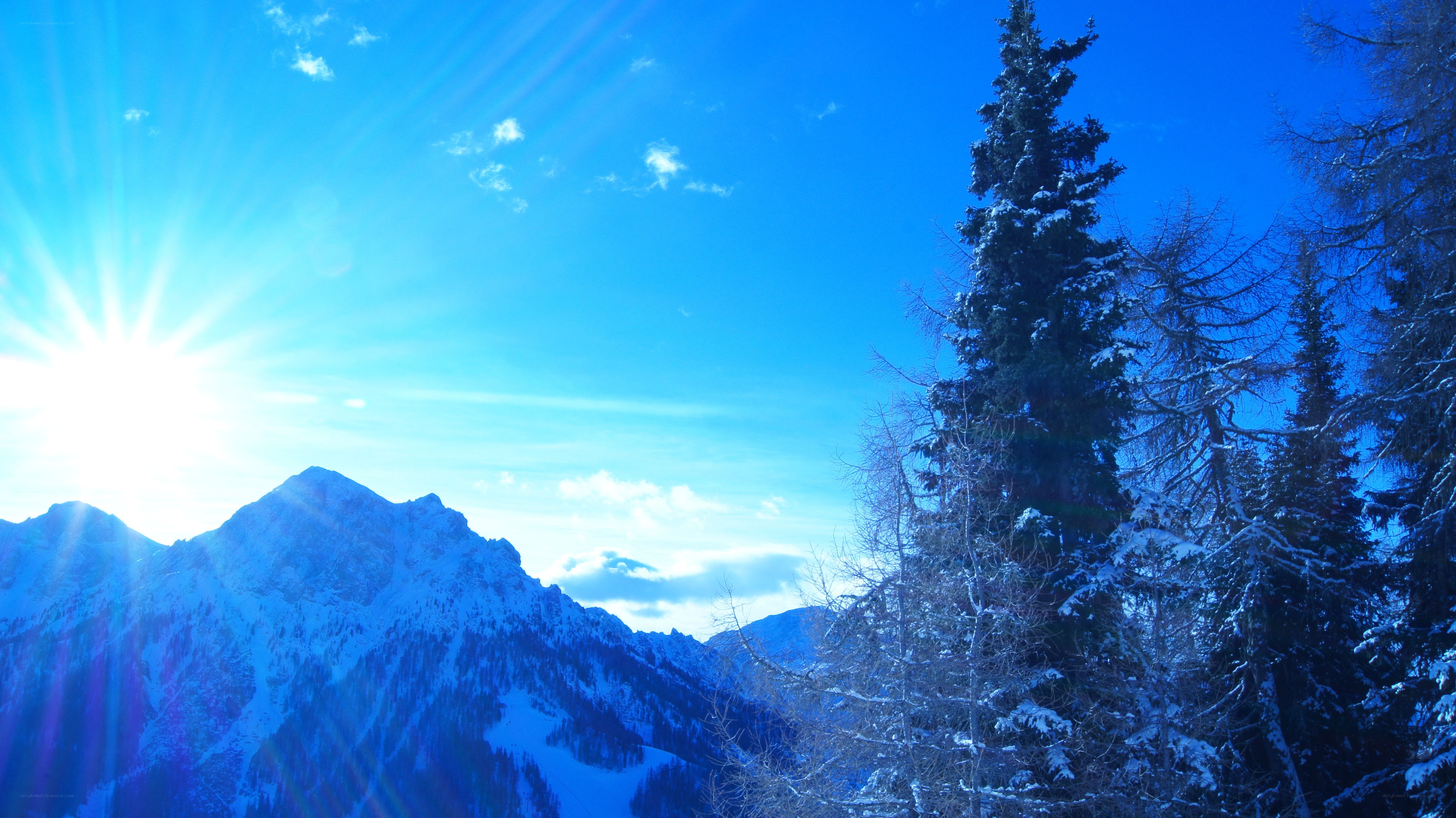 Sunlit snow-covered mountains