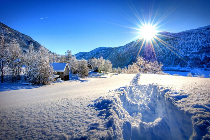 Sunlit snow-covered valley