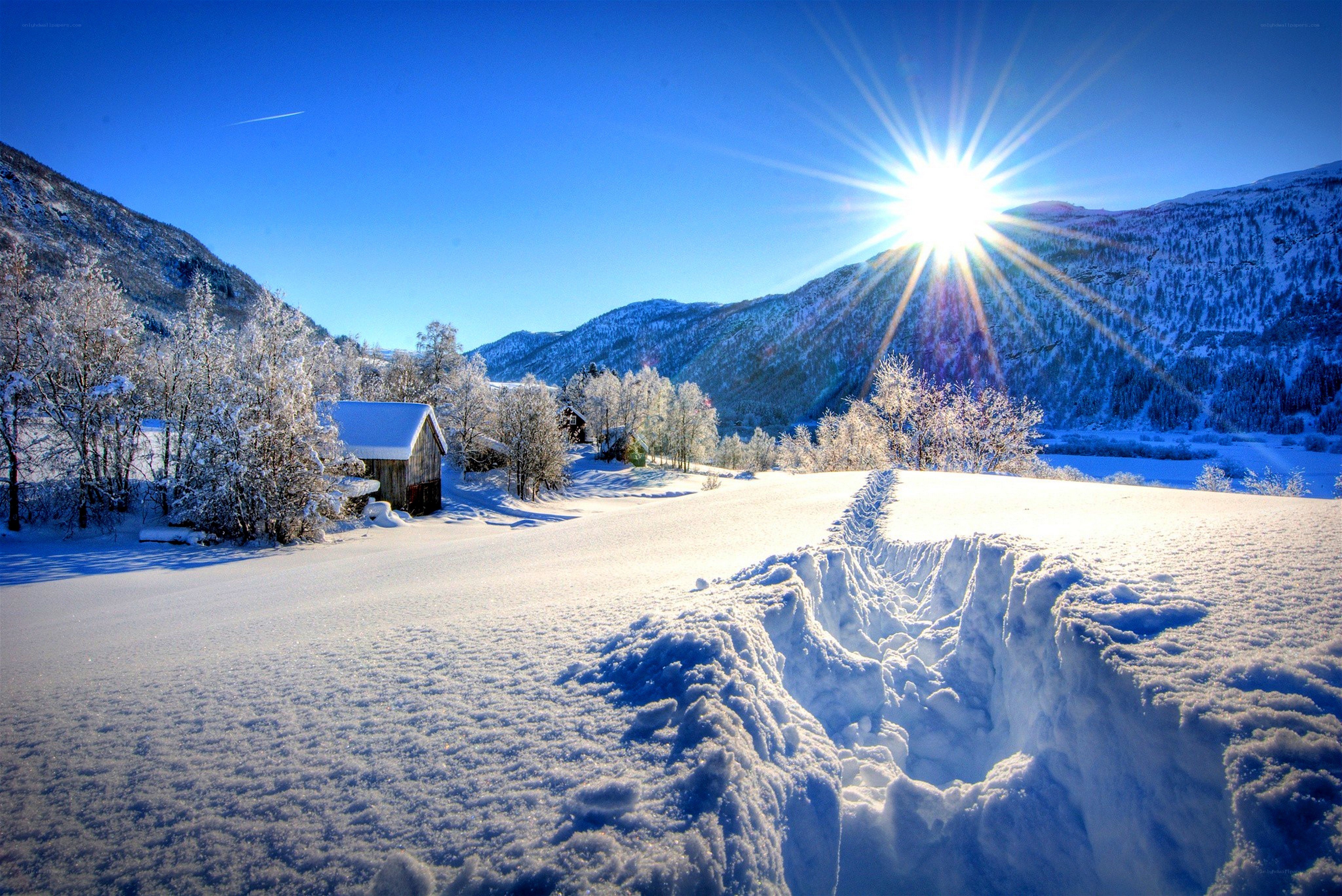 Sunlit snow-covered valley