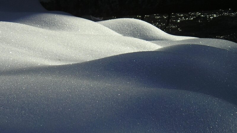 Sunlit snow dunes