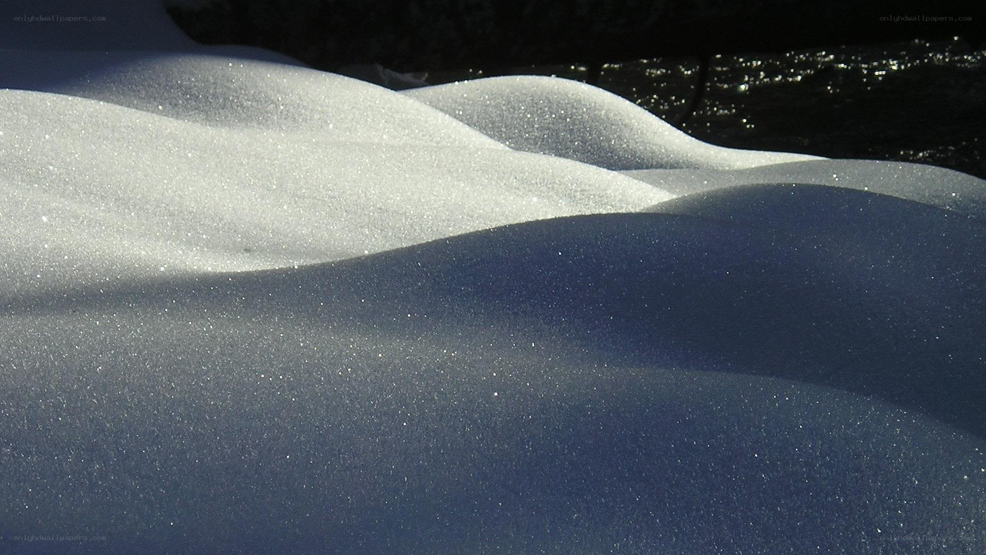 Sunlit snow dunes