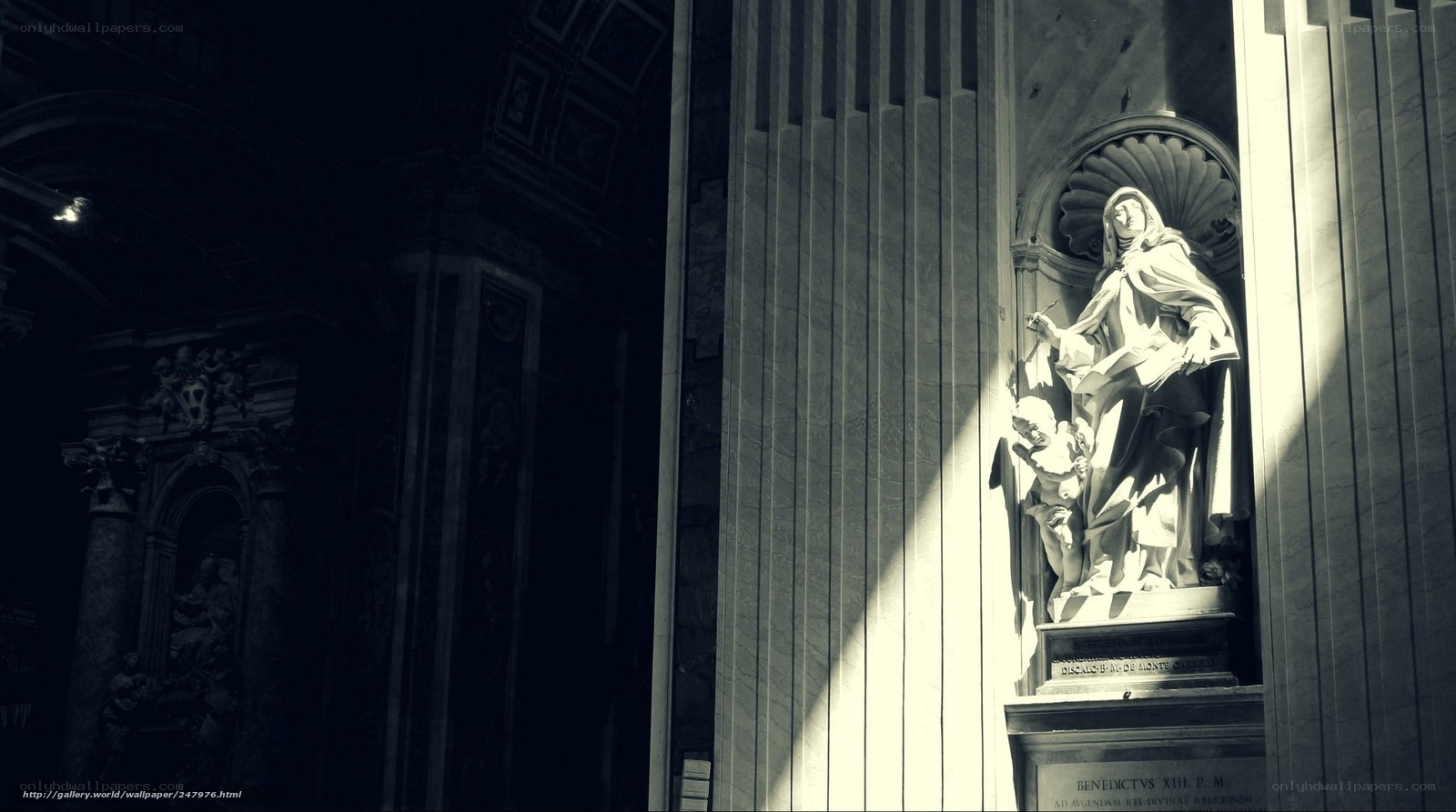 Sunlit statue in a cathedral