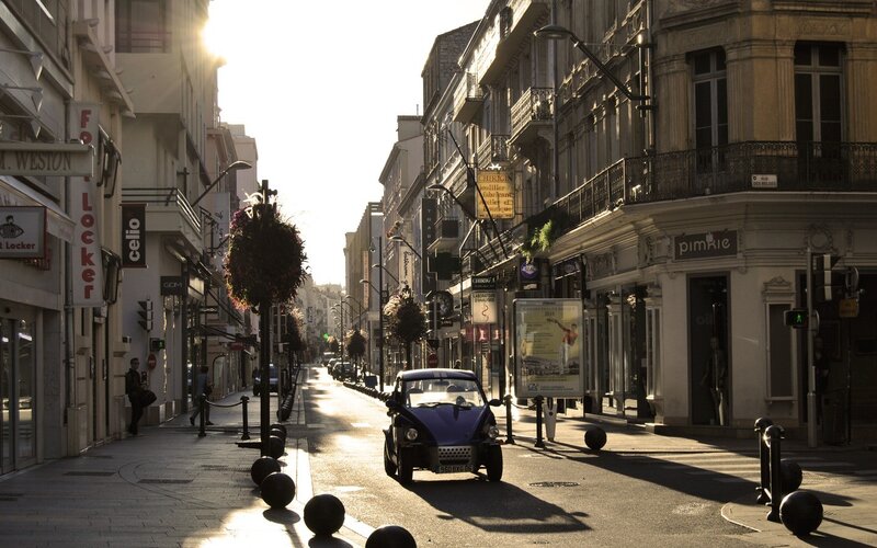 Sunlit street in a European city