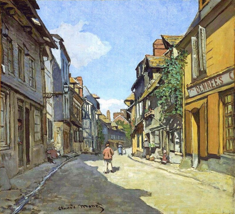 Sunlit street in a French town