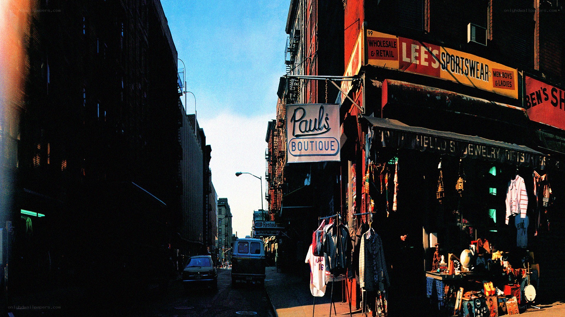 Sunlit street with vintage storefronts