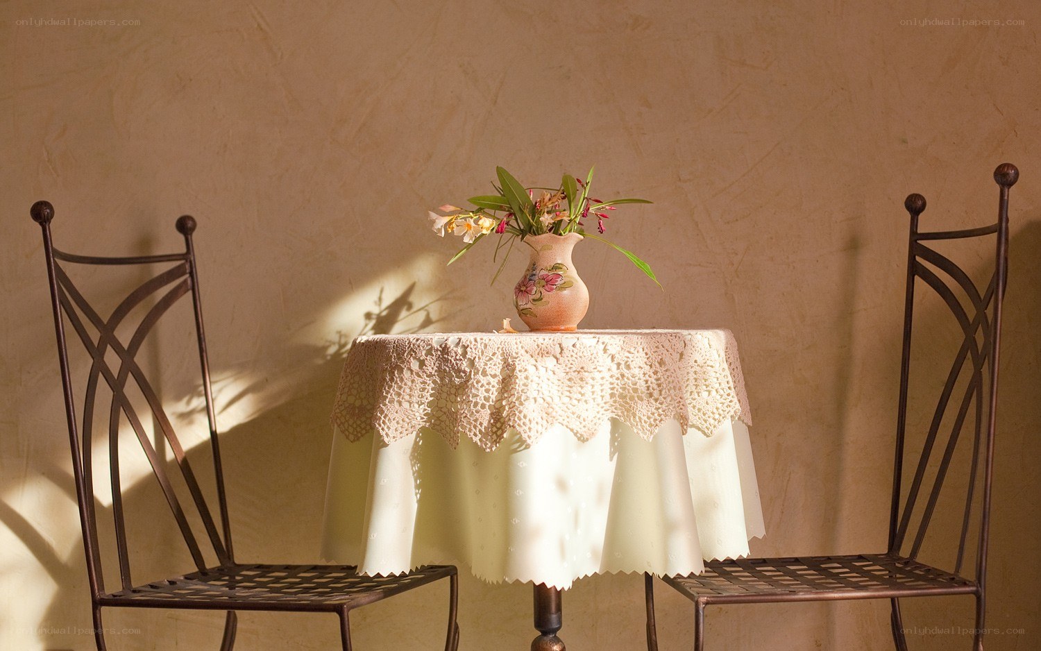 Sunlit table with flowers