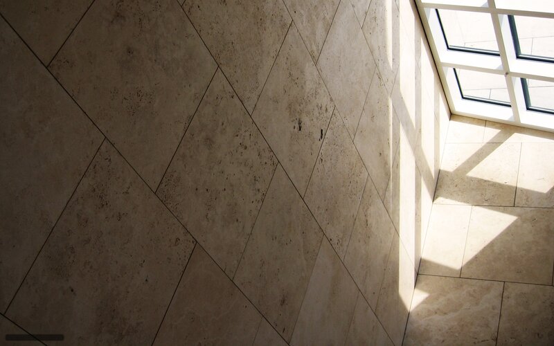 Sunlit tile floor corner