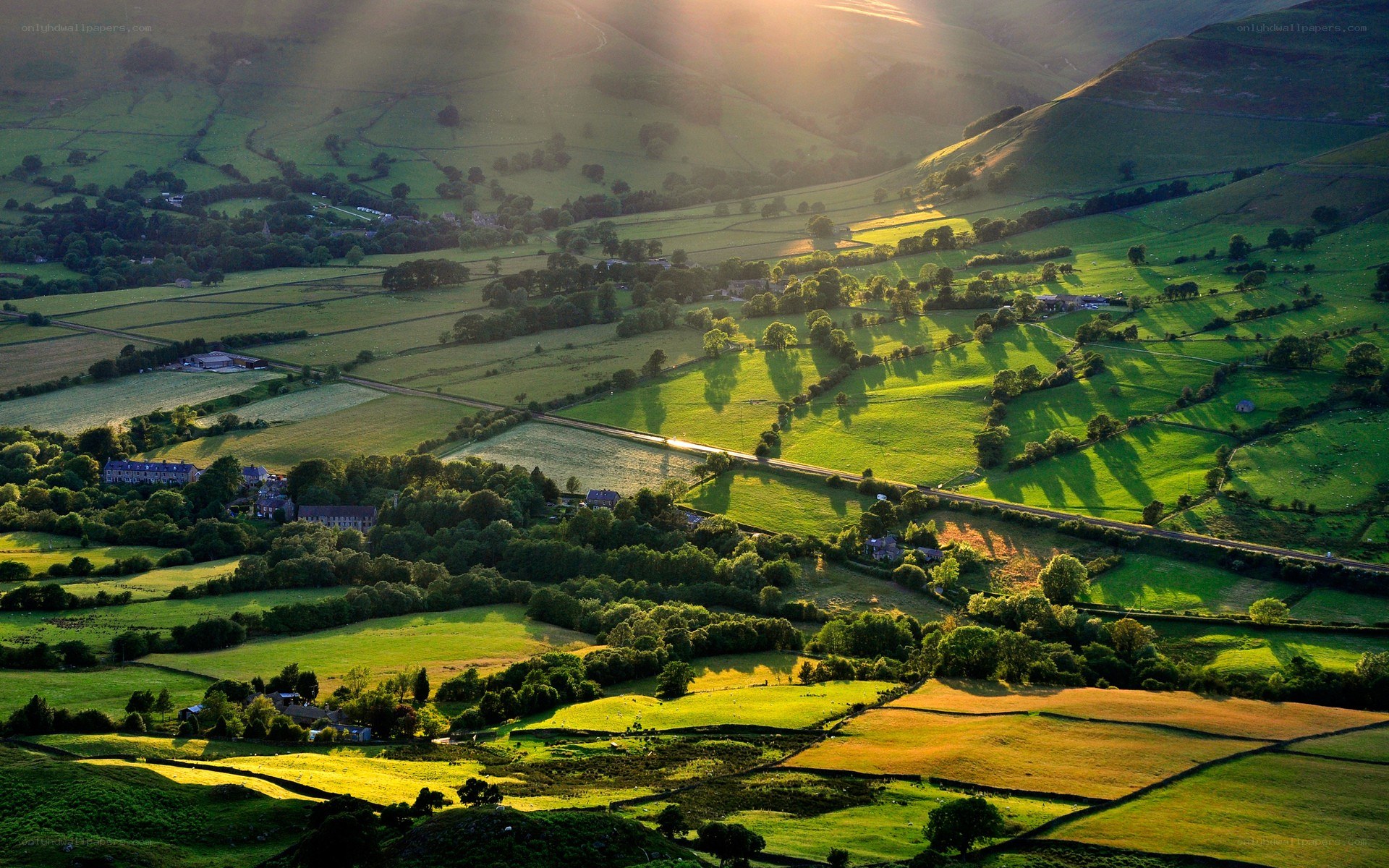 Sunlit valley landscape