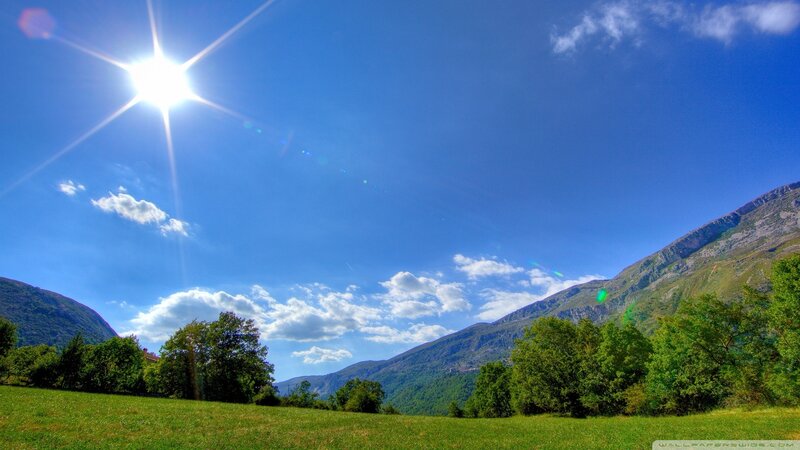 Sunlit Valley with Mountains