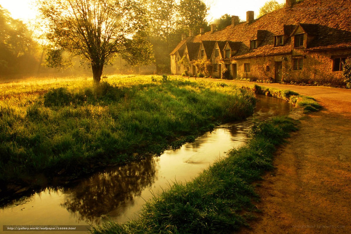 Sunlit village by the river