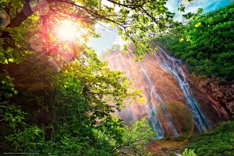 Sunlit Waterfall in Forest — Green, Serene