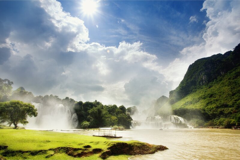 Sunlit waterfall landscape