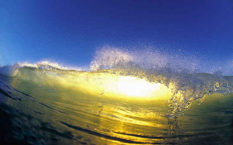 Sunlit wave breaking