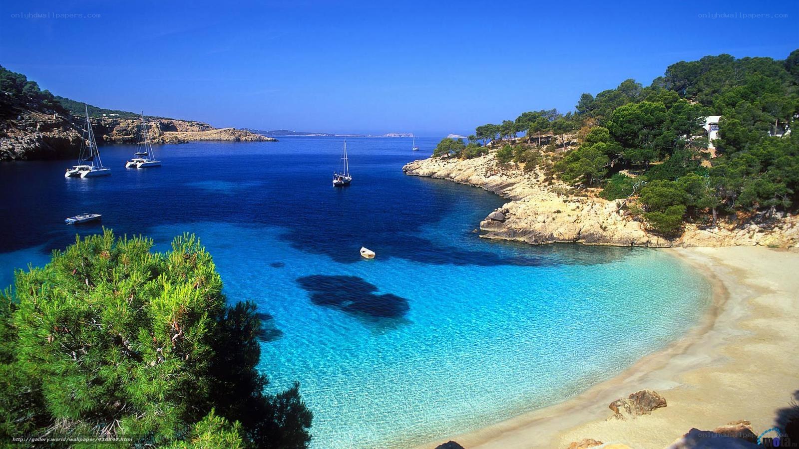 Sunny bay with sailboats