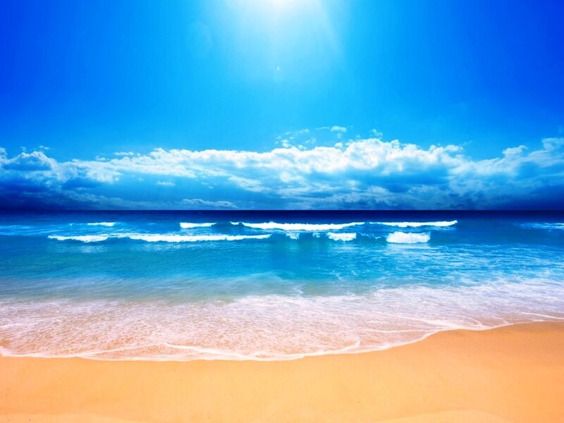 Sunny beach with blue sky
