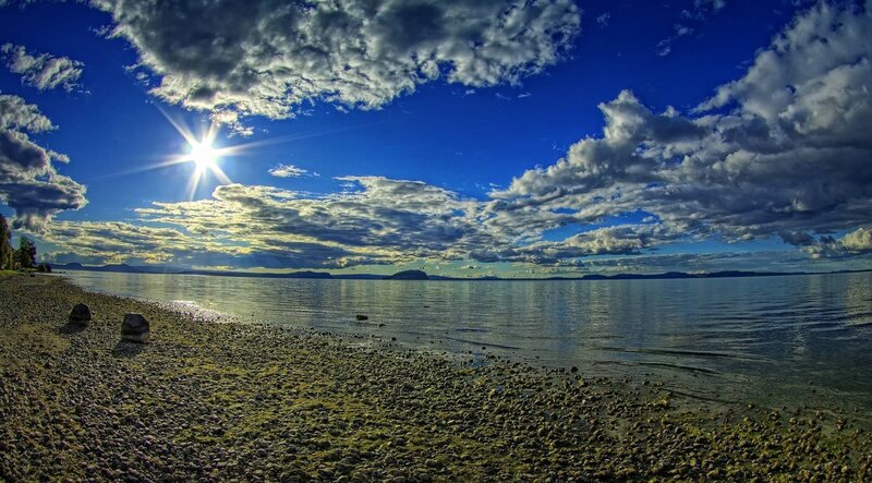 Sunny Beach with Rocks — Blue