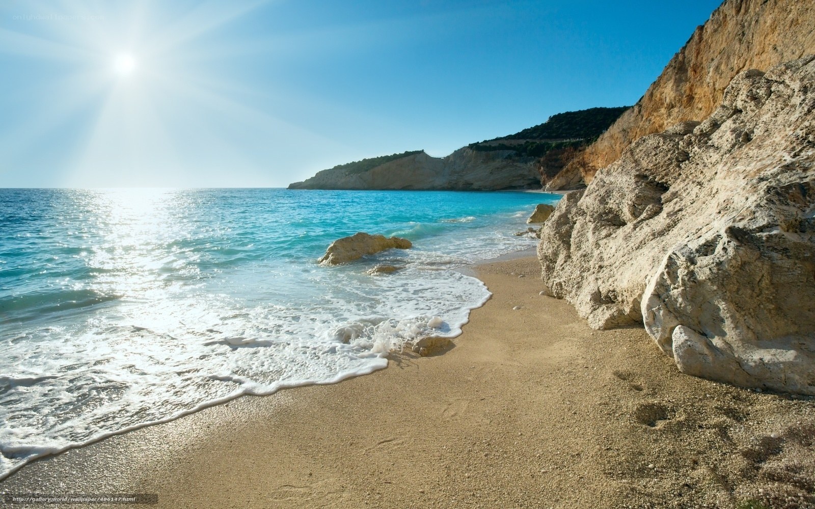 sunny beach with turquoise water