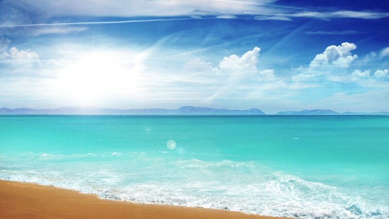 Sunny beach with turquoise water