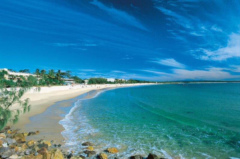 sunny beach with turquoise water