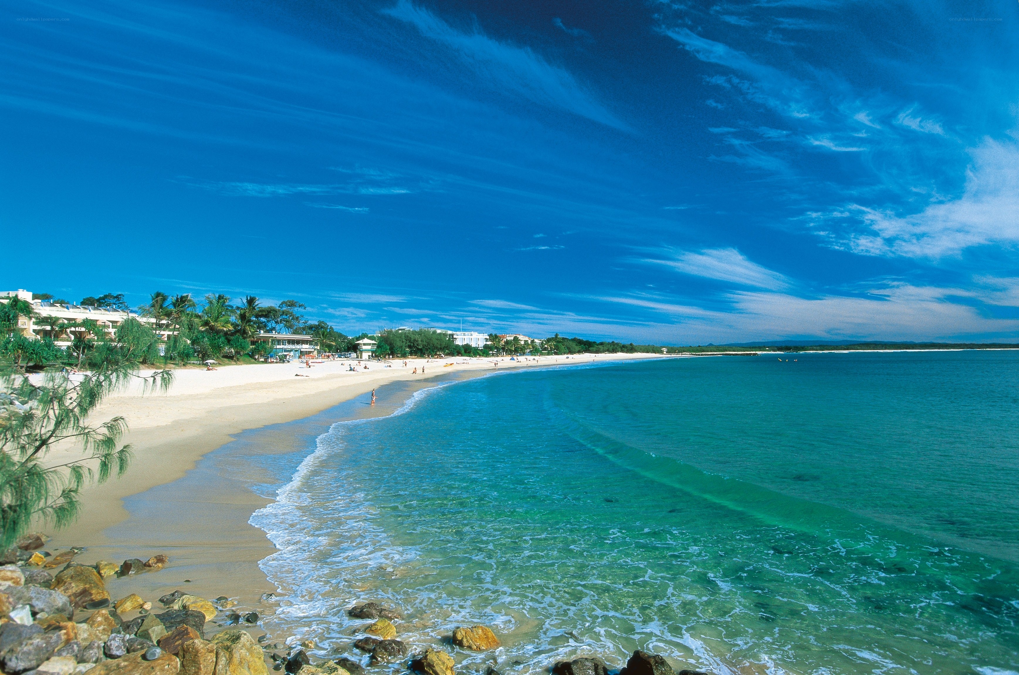 sunny beach with turquoise water