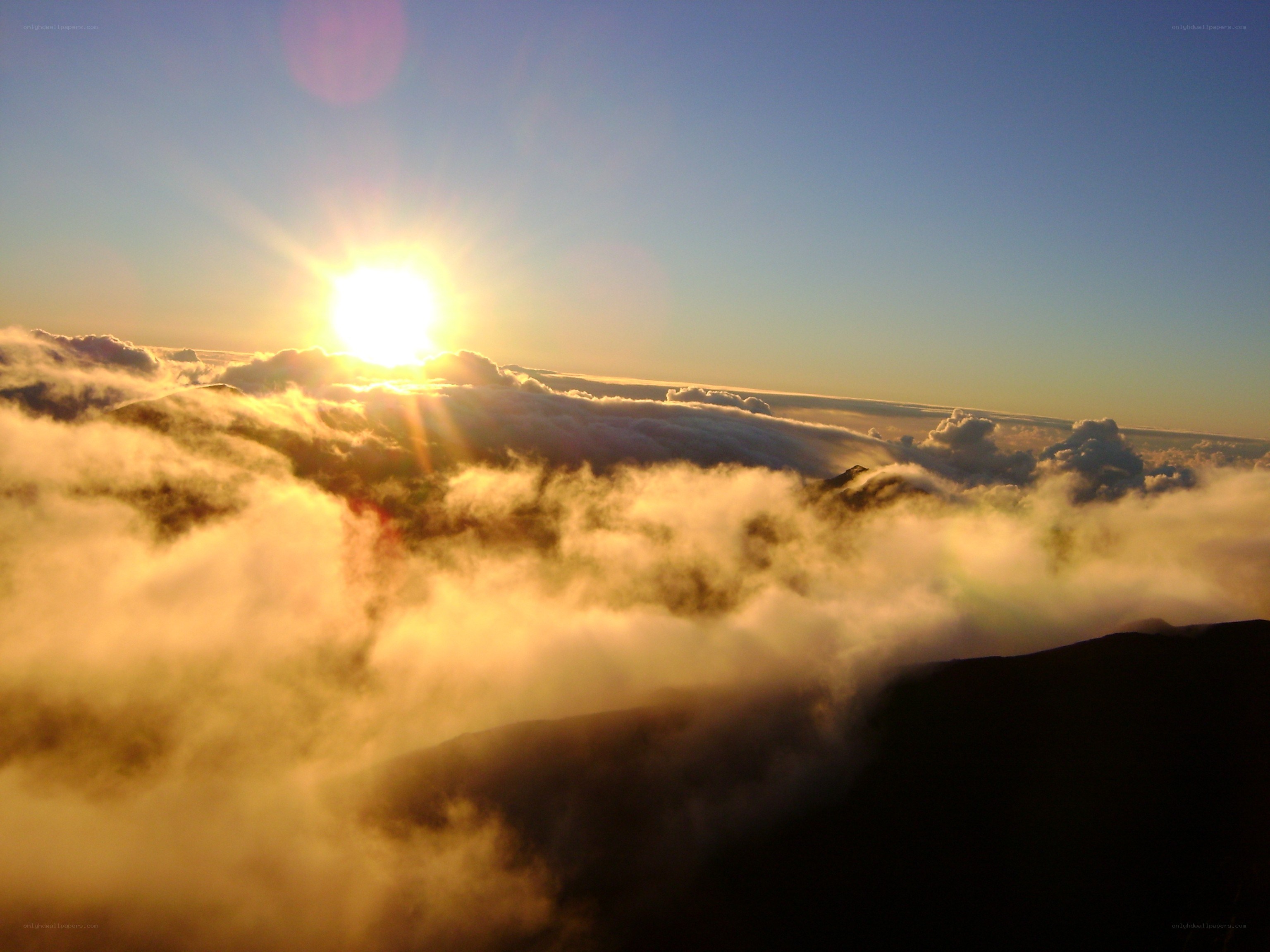 Sunrise above the clouds