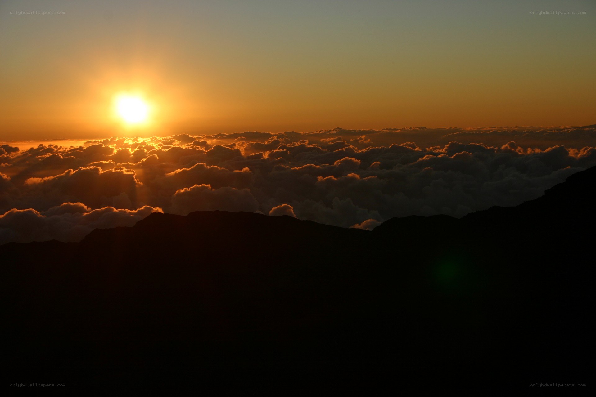 Sunrise above the clouds