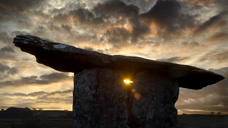 Sunrise at ancient stone monument