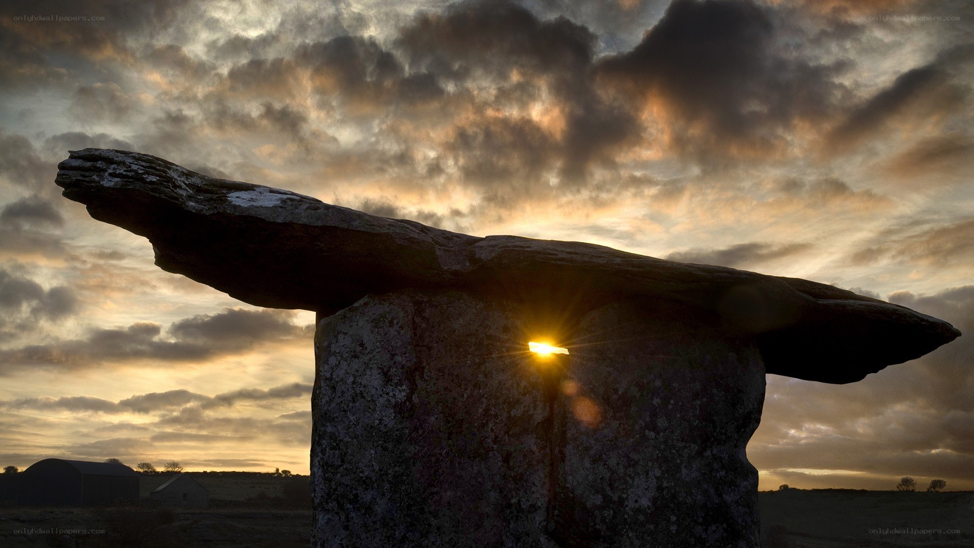 Sunrise at ancient stone monument