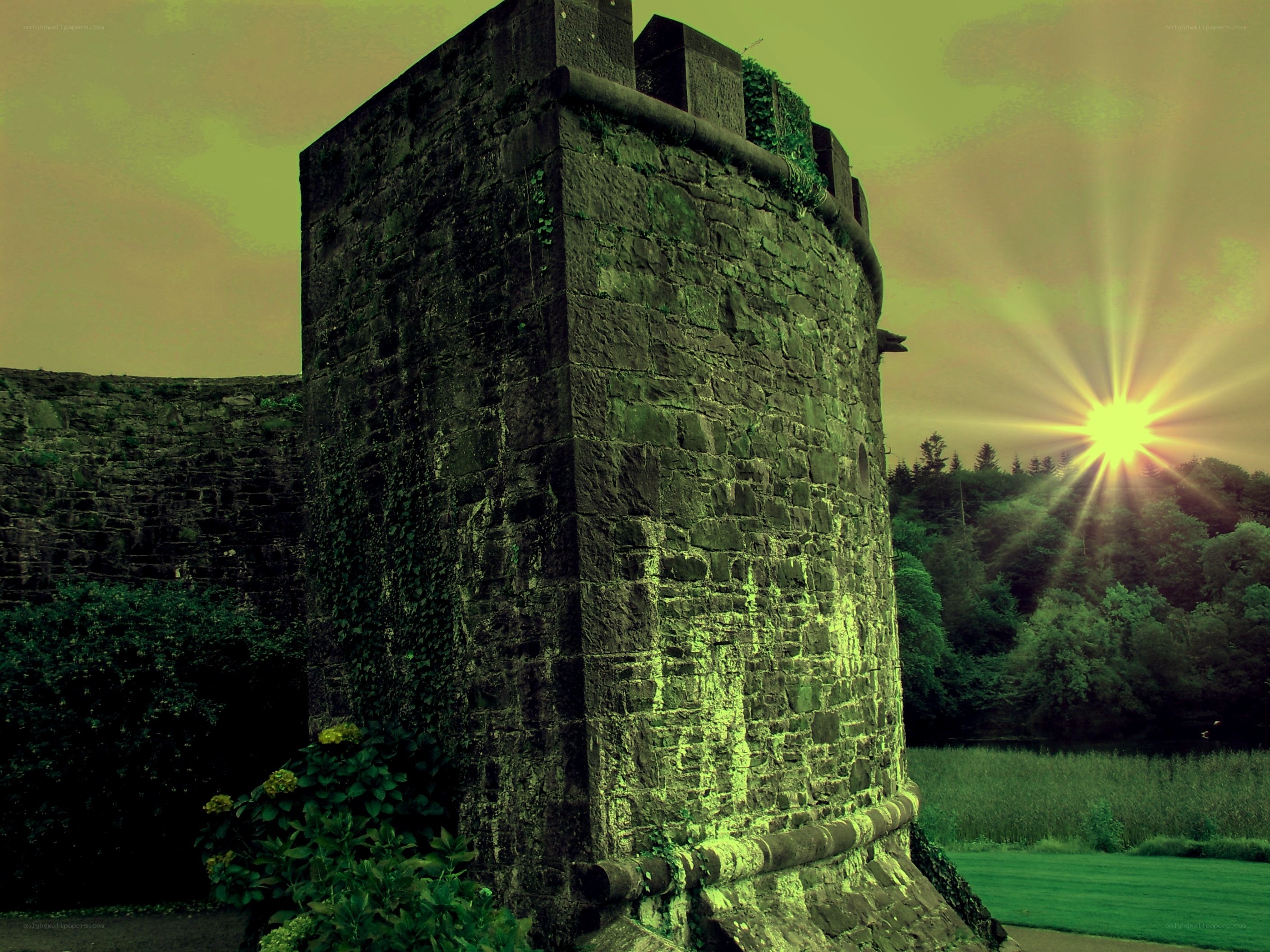 Sunrise at ancient stone tower