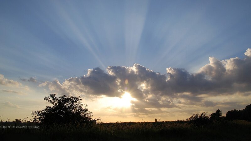 Sunrise Behind Clouds — Blue