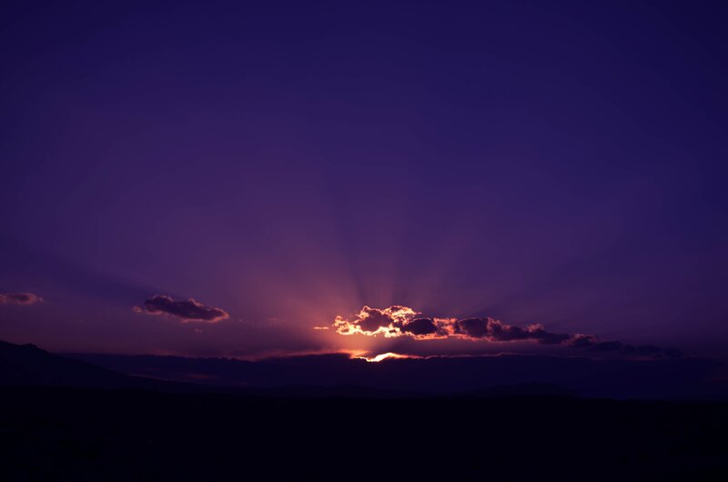Sunrise Behind Clouds — Purple