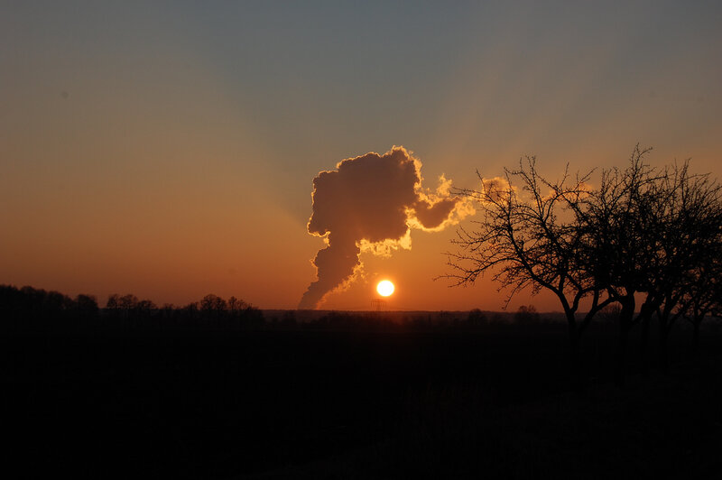 Sunrise Behind Smoke Plume