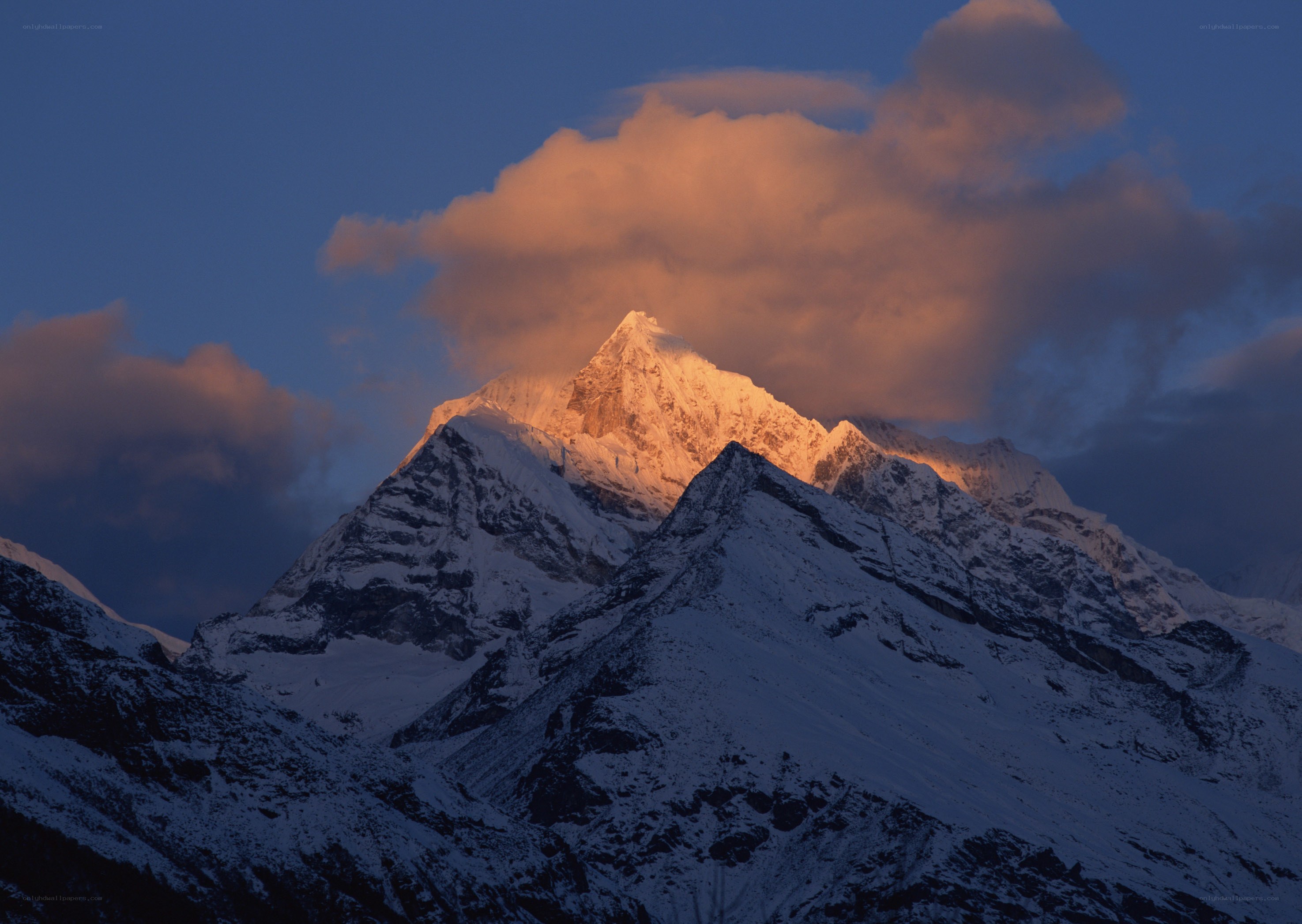 Sunrise on a snow-capped mountain