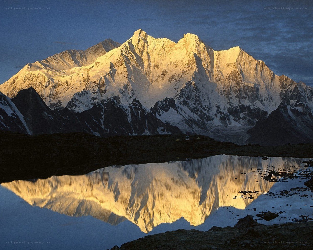 Sunrise on a snow-capped mountain