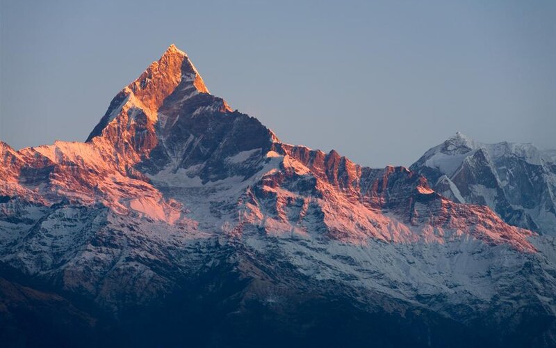 Sunrise on a snow-capped mountain