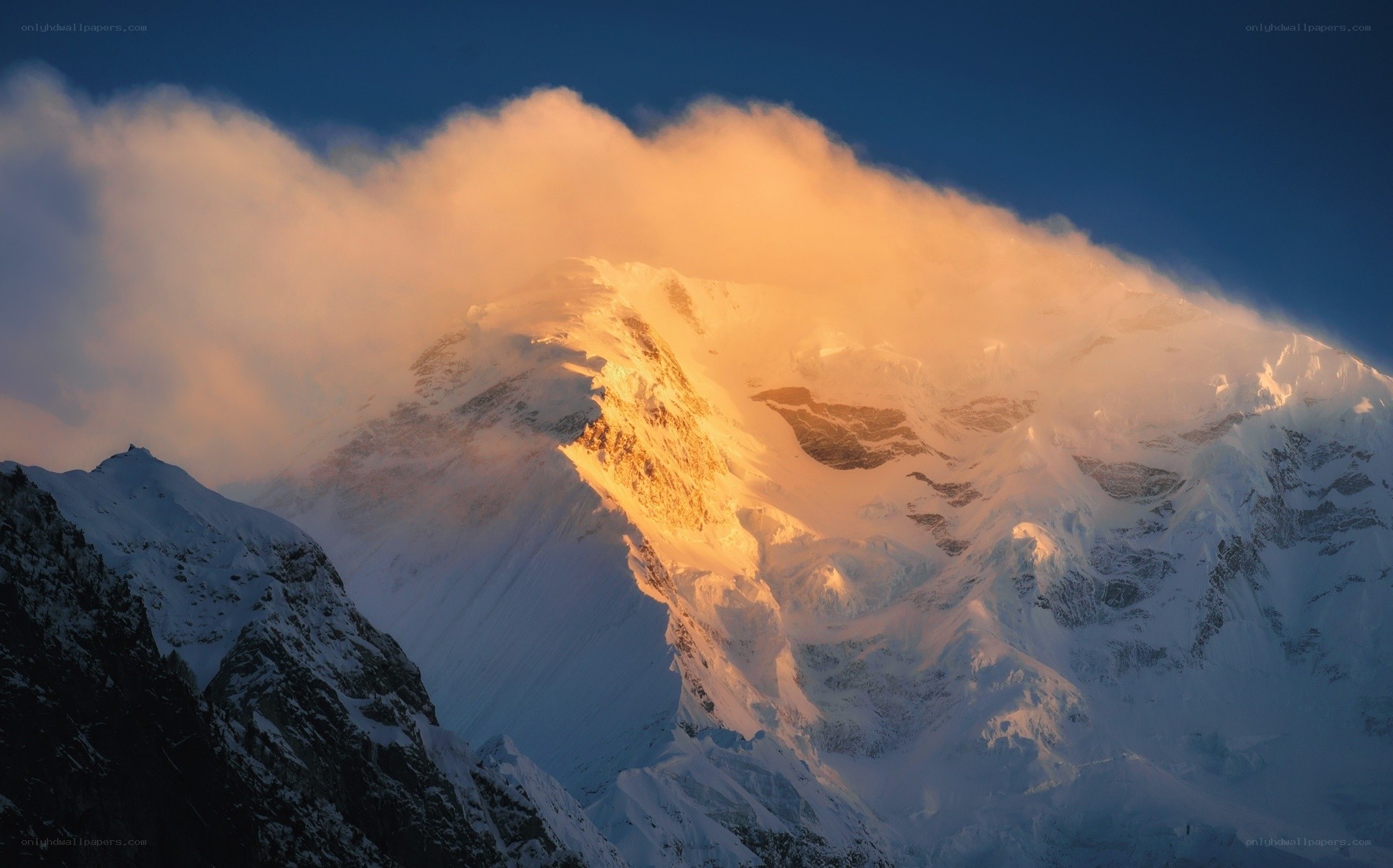 Sunrise on a snow-capped mountain