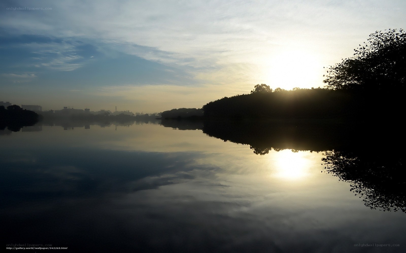 Sunrise over a calm lake